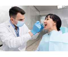 Smile Restoration with Full Mouth Rehabilitation in Homeland