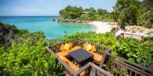 Tranquility balcony over tropical lagoon surrounded by tropical greenery